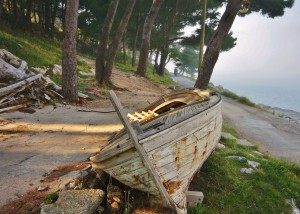 Old boat next to a road on Cavtat costline, Croatia