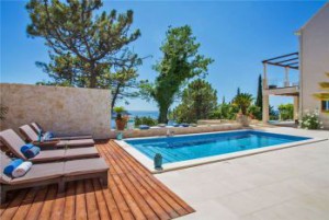 View of swimming pool with sea view from luxury holiday villa near Durbrovnik, Croatia