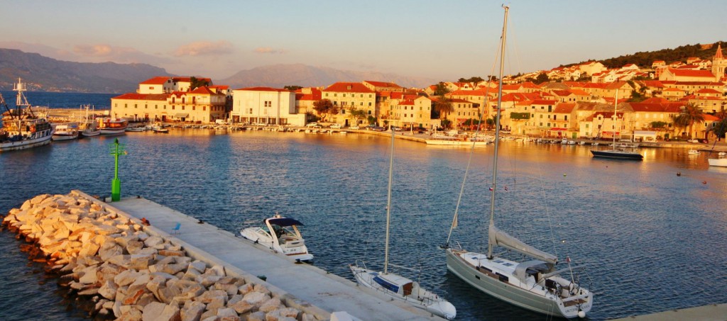 Sunset over Postira's harbour on Brac Island, Croatia