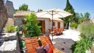 Terrace view of a stone cottage for 2-3 people on Peljesac