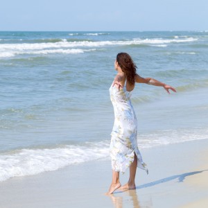 Woman on the beach at the ocean in Portugal